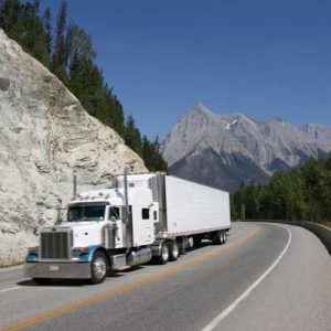 large white long hauler mountain highway