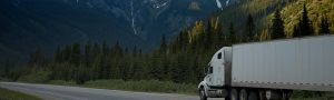 truck driving through mountains